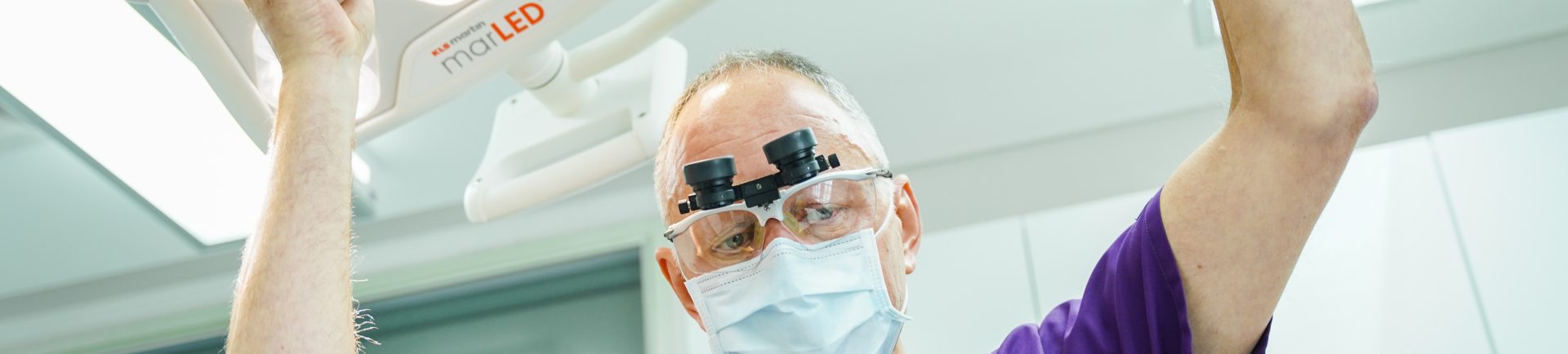 doctor using the surgical lamp