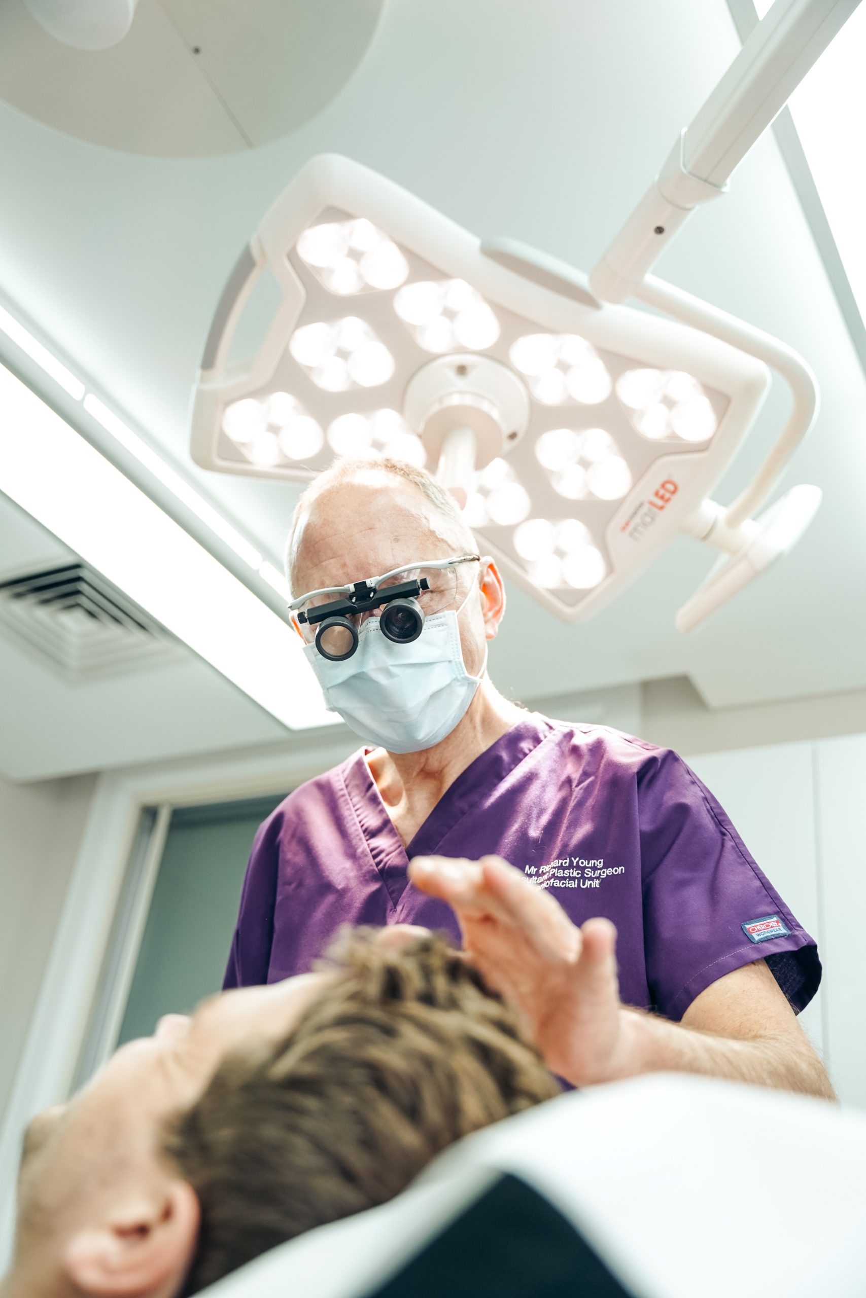 doctor examining patient