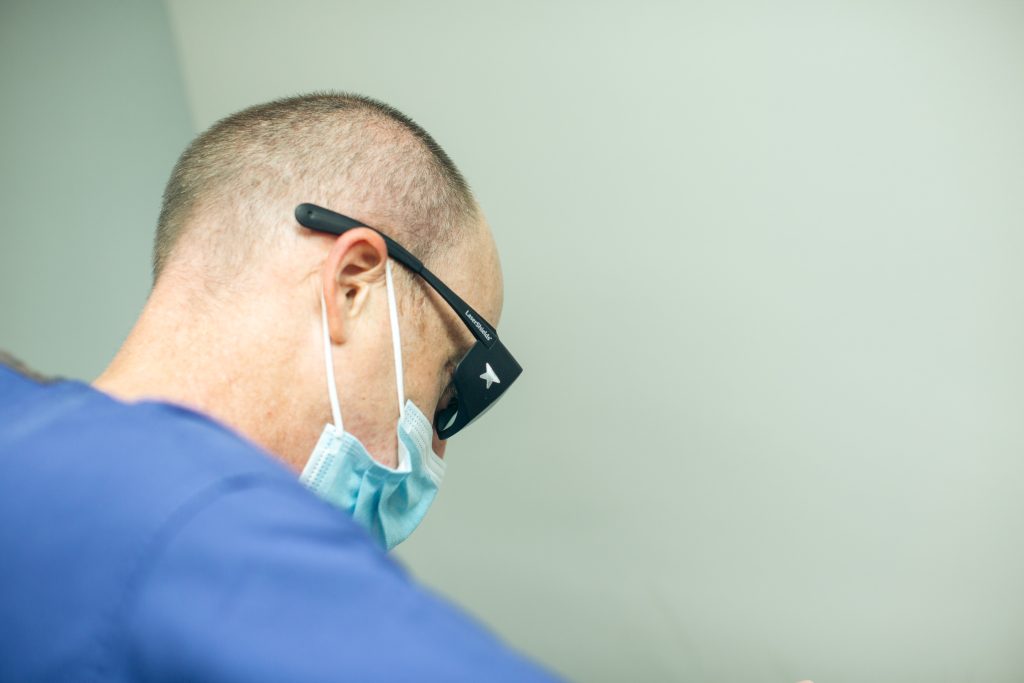 doctor with protective glasses