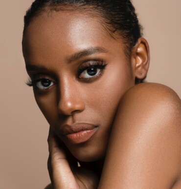 Black female model showing her shoulder